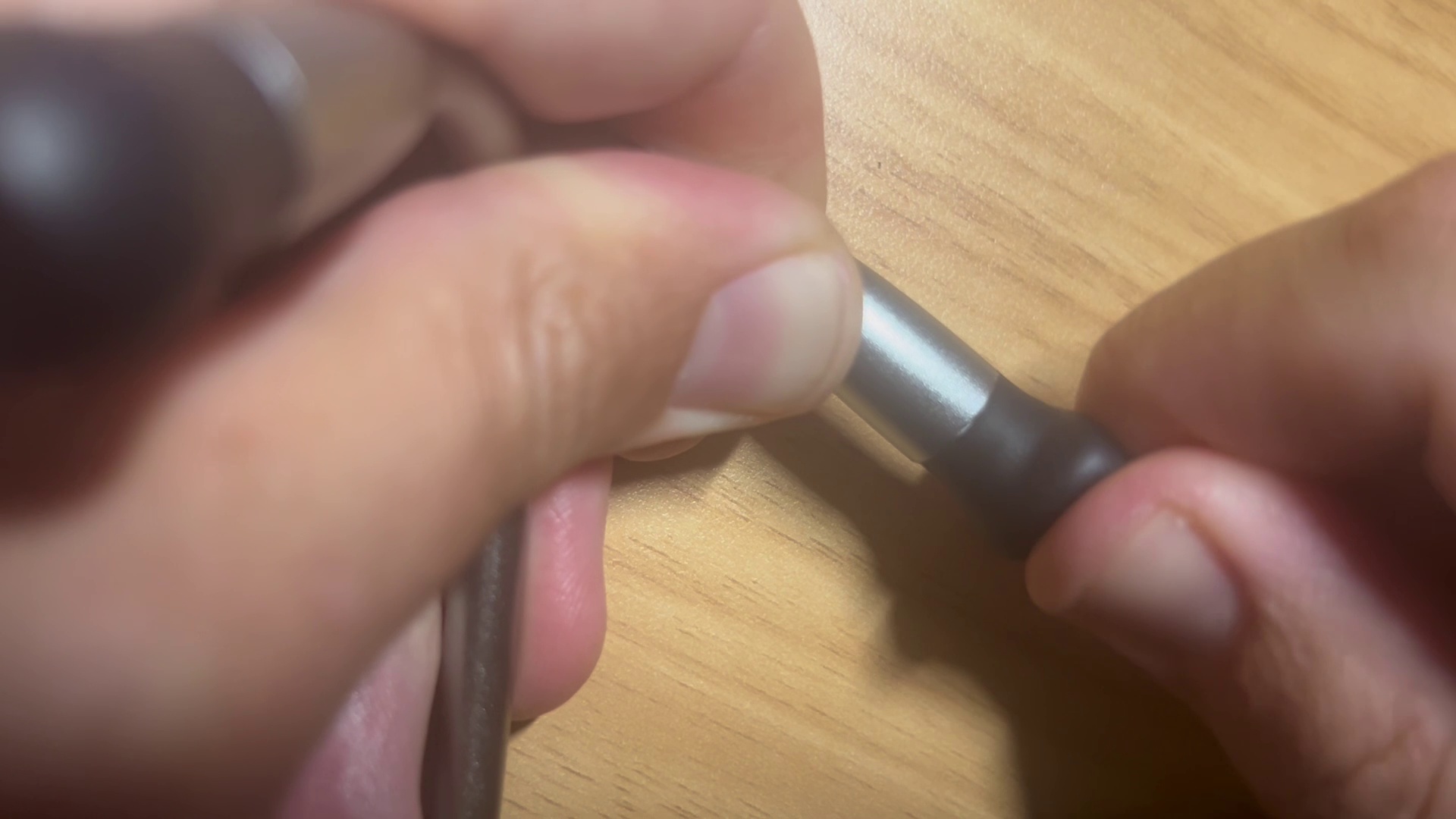 Pressing around the bulge to seat the tip flush